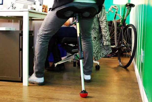 Mogo portable standing seat on the office